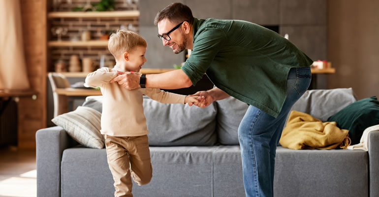 father and son playing