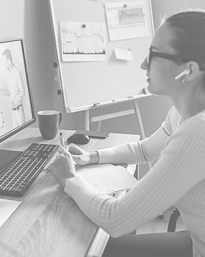 Woman attending a Westmark Wealth Management financial webinar